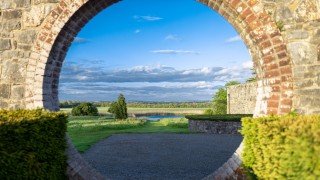 View of the lake through a wall